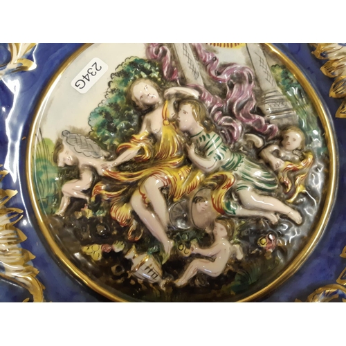 38 - A large Capodimonte porcelain circular charger depicting classical scene