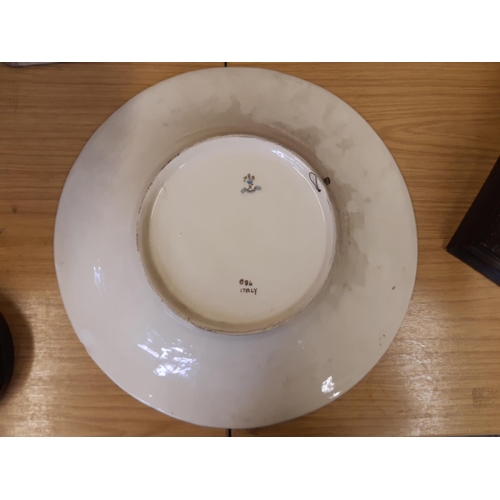 38 - A large Capodimonte porcelain circular charger depicting classical scene