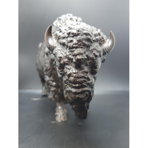 42 - A well detailed 20th century Japanese patinated bronze sculpture of a bison with character mark to b... 