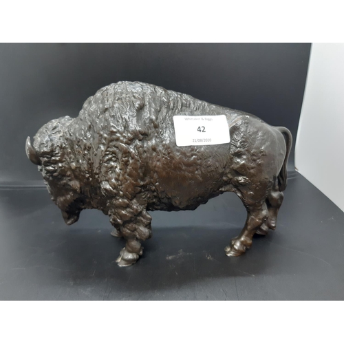 42 - A well detailed 20th century Japanese patinated bronze sculpture of a bison with character mark to b... 