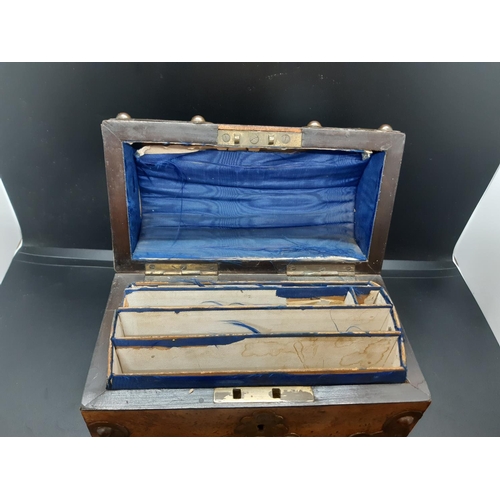 44 - A Victorian dome top figured walnut letter box with applied brass strap work with finely engraved mo... 