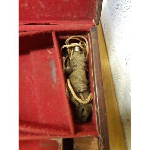 45 - A late 19th/early 20th century brown leather shotgun case, the exterior having heavy duty brass corn... 