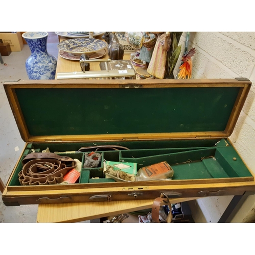 46 - A late 19th/early 20th century brown leather shotgun case, the exterior having heavy duty brass corn... 