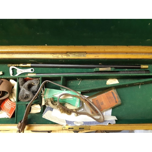 46 - A late 19th/early 20th century brown leather shotgun case, the exterior having heavy duty brass corn... 