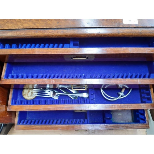 55 - A 19th century oak cased four drawer campaign cutlery canteen (without contents but with original ke... 