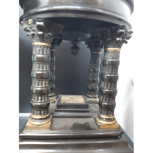 59 - A pair of French Aesthetic movement black marble and gilt metal clock garnitures / stands with circu... 