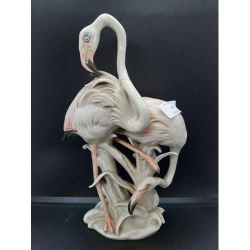 8 - Three porcelain flamingo figurines to include a Goebel example, Austrian Keramos and a Carl Ens Volk... 