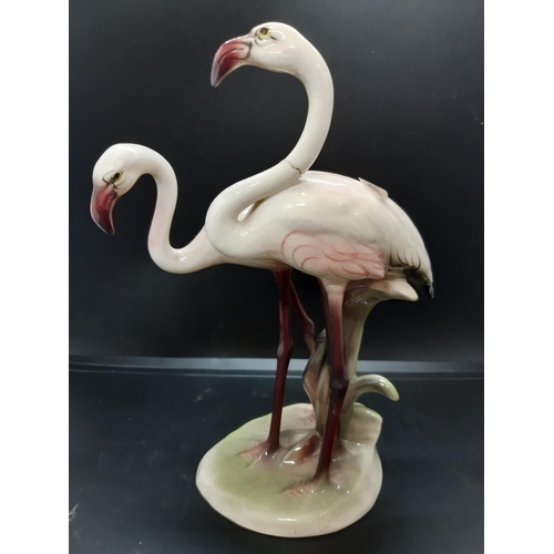 8 - Three porcelain flamingo figurines to include a Goebel example, Austrian Keramos and a Carl Ens Volk... 