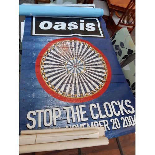 105 - A collection of various sized shop advertising Oasis posters