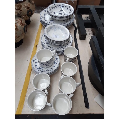 114 - An approx 36 piece Royal Doulton Hartford pattern part dinner service comprising tea cups, bowls, pl... 