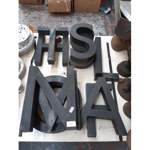 115 - A collection of 13 matching vintage metal shop letters including ‘T’, ‘H’, ‘A’ etc. - each measuring... 