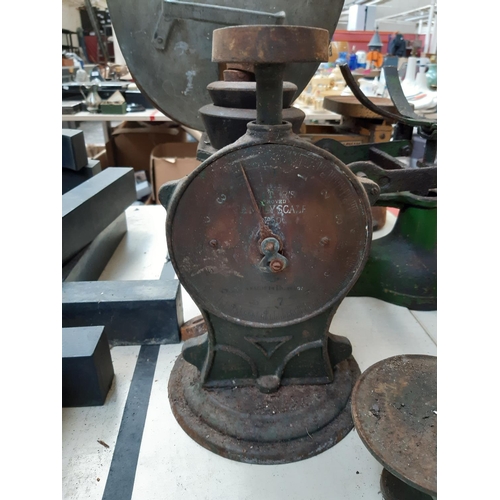 116 - Six vintage kitchen scales of various sizes together with a quantity of cast iron weights