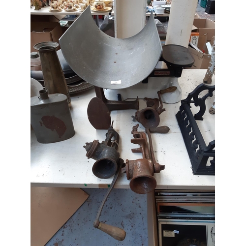 118 - Five pieces of metalware to include a large set of ‘H. Pooley & Son LTD’ scales, three cast iron tab... 