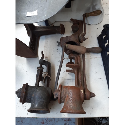 118 - Five pieces of metalware to include a large set of ‘H. Pooley & Son LTD’ scales, three cast iron tab... 