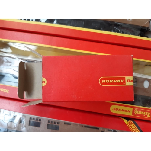 127 - A collection of boxed Hornby ‘OO’ gauge accessories to include R.211 lime wagon, R102 mineral wagon,... 