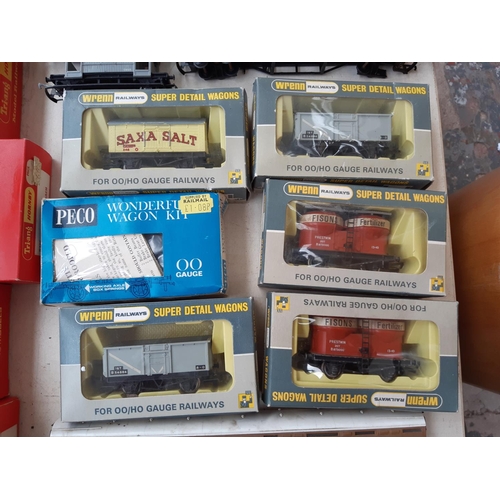 128 - A large collection of mostly Wrenn boxed and unboxed model railway accessories to include W6000 Pull... 