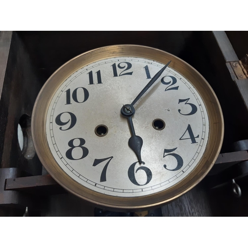 131 - Two vintage oak cased chiming wall clocks with silvered dials, both with keys and pendulums