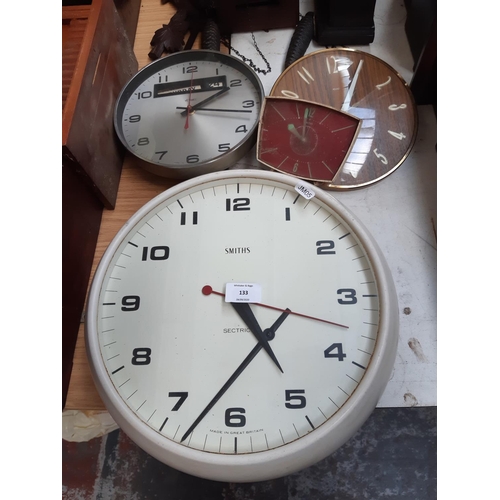 133 - Four various retro clocks to include Smiths Sectric white wall clock, teak cased Metamec clock movem... 