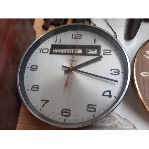 133 - Four various retro clocks to include Smiths Sectric white wall clock, teak cased Metamec clock movem... 