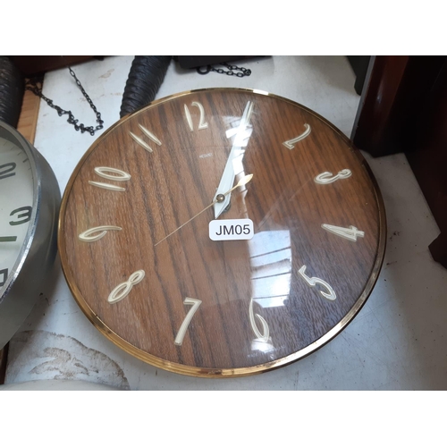 133 - Four various retro clocks to include Smiths Sectric white wall clock, teak cased Metamec clock movem... 