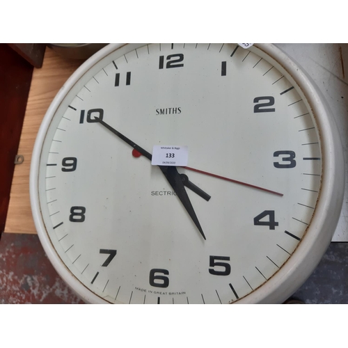 133 - Four various retro clocks to include Smiths Sectric white wall clock, teak cased Metamec clock movem... 