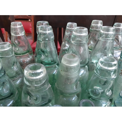 146 - A collection of vintage glass bottles to include apothecary bottles, ‘R. Stothert & Son‘ bottle, ‘Pa... 