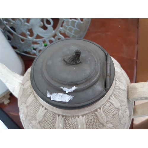 154 - A Victorian white creamware teapot with pewter lid