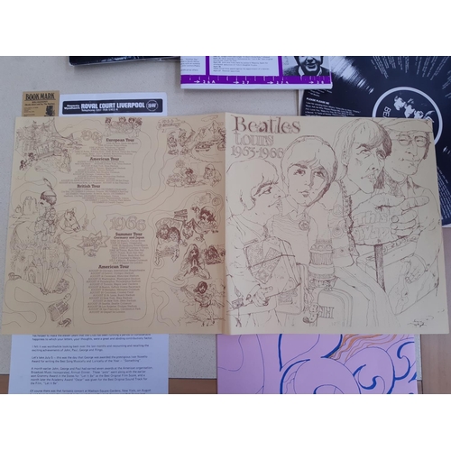 160 - The Beatles Collection “From Liverpool To The World” 1974 UK fan club folder. Featured is a custom l... 