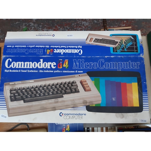 164 - A Commodore 64 micro computer with original box and manual