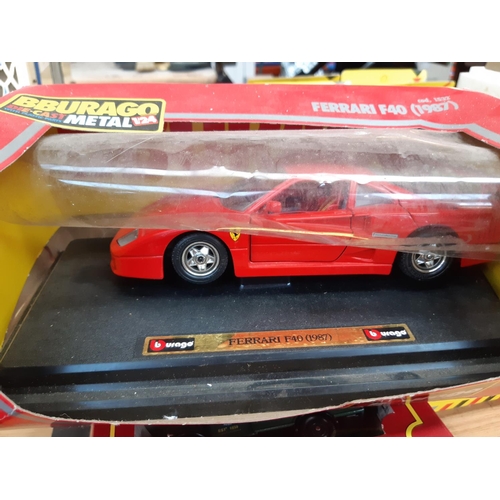 166 - A large collection of boxed die cast vehicles to include a Bburago Ferrari F40, seven Cameo merchant... 