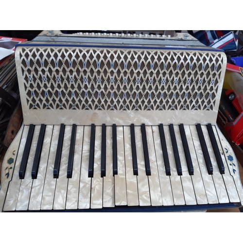 167 - A vintage Hohner Tango II mother of pearl effect 80 bass accordion