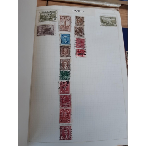 169 - Two stamp albums to include a red ‘Strand’ and a ‘Lancaster Major’, each containing a selection of w... 