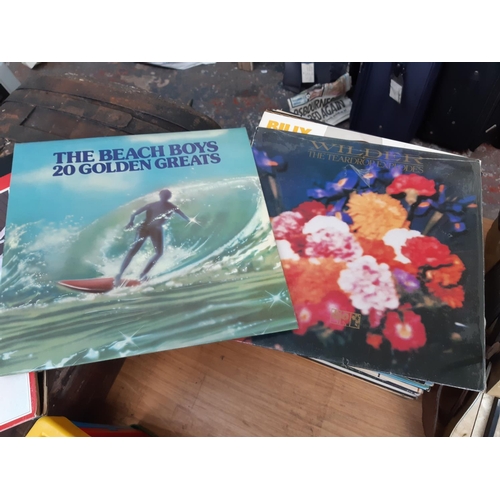 170 - A collection of both LP and 45 records to include ‘The Beatles/1962-1966’, ‘Pink Floyd - The Dark Si... 