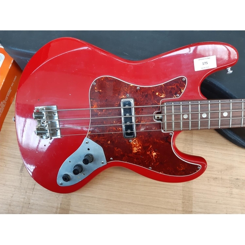 175 - An vintage red unbranded Fender jazz style model 1971 four string electric bass guitar with Tiesco p... 