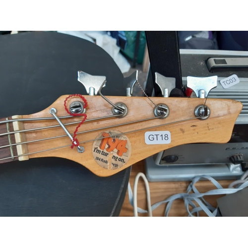 175 - An vintage red unbranded Fender jazz style model 1971 four string electric bass guitar with Tiesco p... 