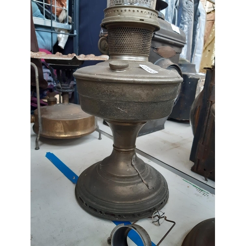 181 - Two vintage chromed oil lamps together with a brass Primus stove