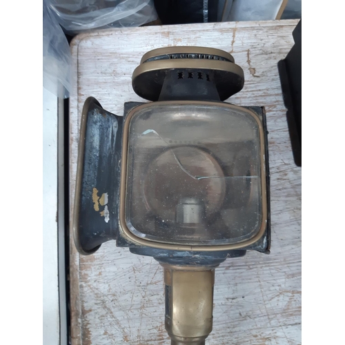 187 - A vintage brass and black metal hand held railway signal lantern