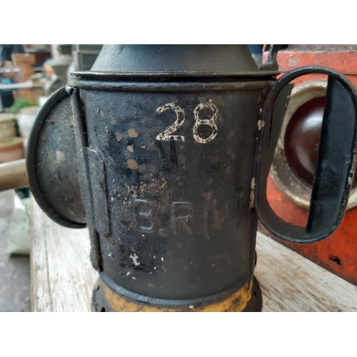 190 - An early/mid 20th century black painted B.R (W) railway signal lamp together with A mid 20th century... 