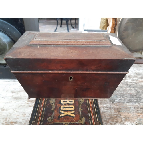 191 - Two boxes to include a Georgian sarcophagus mahogany tea caddy (missing interior) and a Victorian Ge... 