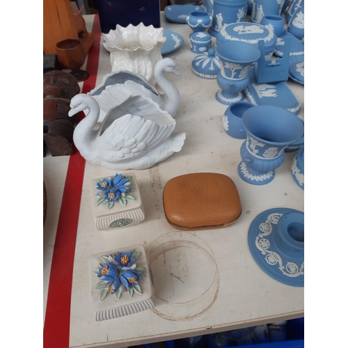 200 - A large collection of mixed china to include 33 pieces of pale blue Wedgwood Jasperware, a pink Wedg... 