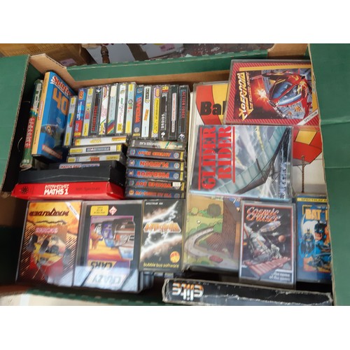 163 - Two boxes containing a large collection of Sinclair ZX Spectrum games (both 48k and 128k games) to i... 