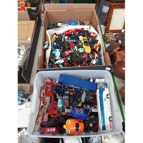 202 - Two boxes containing a large collection of die cast vehicles to include Days Gone By, Corgi, Maisto ... 