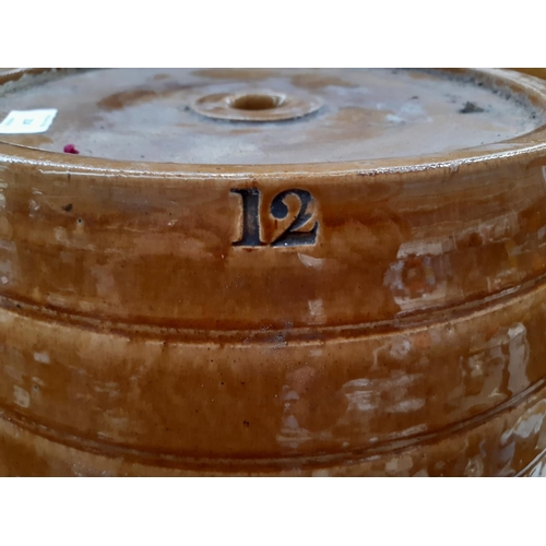 214 - A large salt glazed Price Of Bristol stoneware barrel - measuring 55cm in height