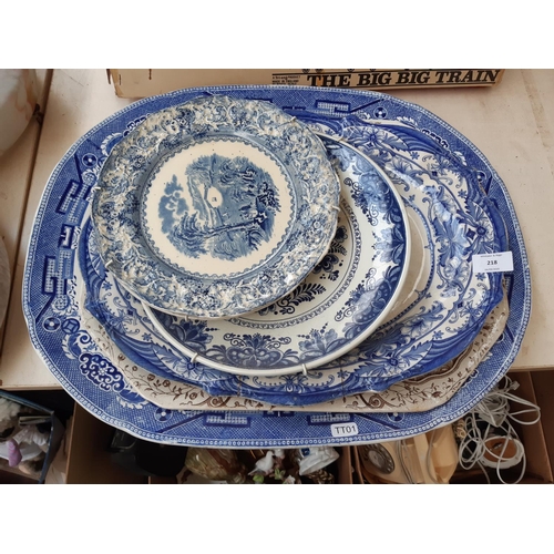 218 - A collection of blue and white china to include a Delft Blauw charger, large J. Meir & Son serving p... 