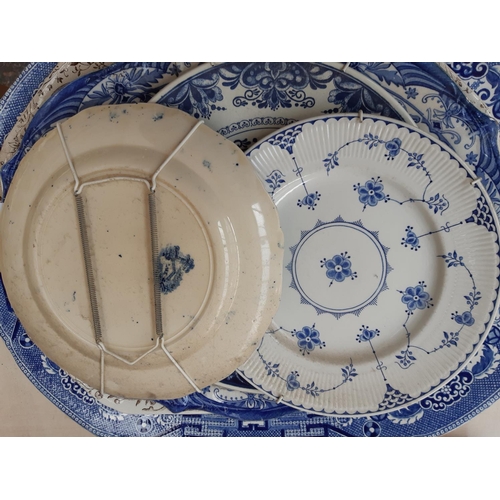 218 - A collection of blue and white china to include a Delft Blauw charger, large J. Meir & Son serving p... 