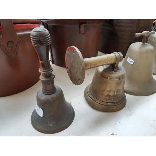 220 - A large vintage brass bell (missing ringer) together with two smaller brass bells and a Victorian br... 