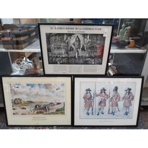 226 - Three framed prints to include ‘The earl of Huntington’s regiment of foot’, ‘Trebah Beach 1944’ mili... 