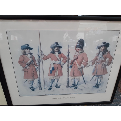 226 - Three framed prints to include ‘The earl of Huntington’s regiment of foot’, ‘Trebah Beach 1944’ mili... 