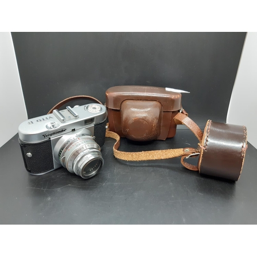 231A - A vintage brown leather cased Voighander Vito B film camera with Voigtlander Skopar 50mm lens