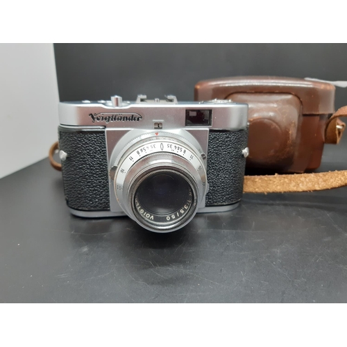 231A - A vintage brown leather cased Voighander Vito B film camera with Voigtlander Skopar 50mm lens